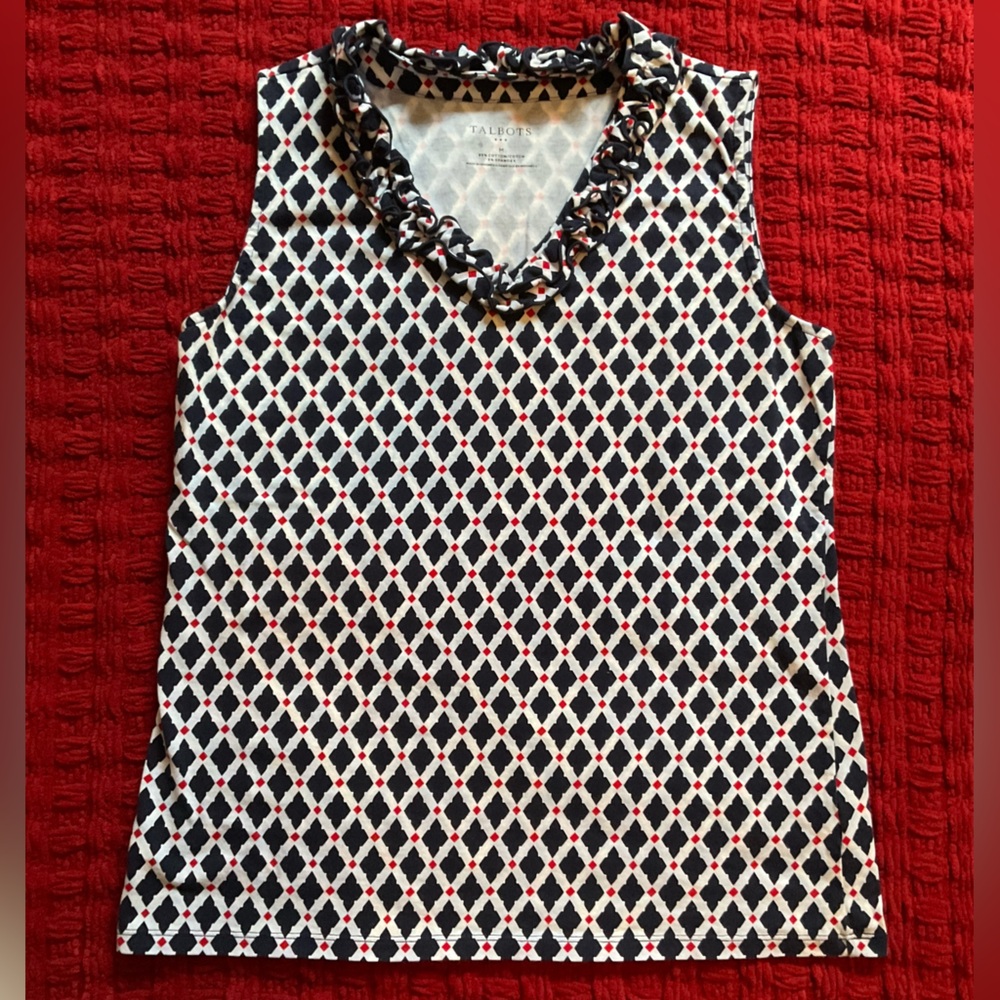 Navy, red & White sleeveless top with ruffled neckline.